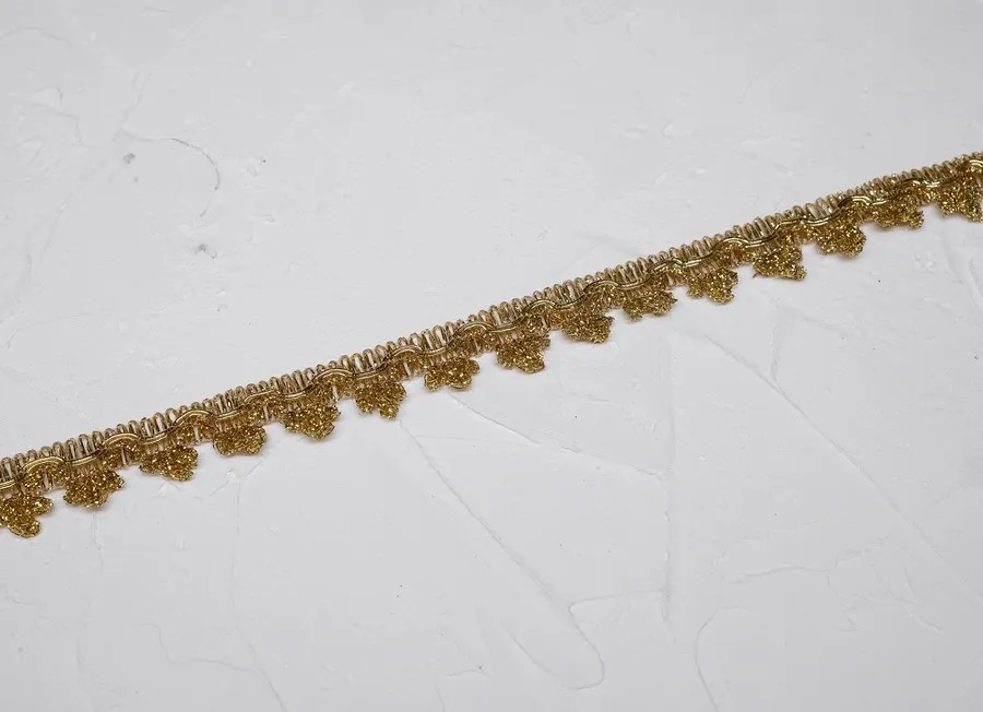 Тесьма фистоны мелкие золото (пэ 100%)