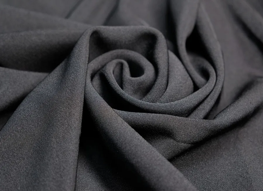 Ткань костюмно-плательная однотон. черный ш1,5 ( пэ 100%) стрейч