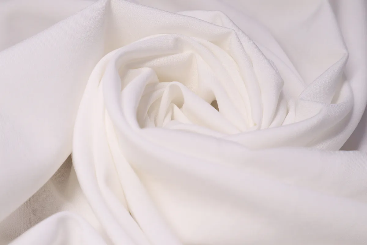 Ткань плательная вискоза стрейч молочный ш 1,5 (вискоза 97% эл3%)